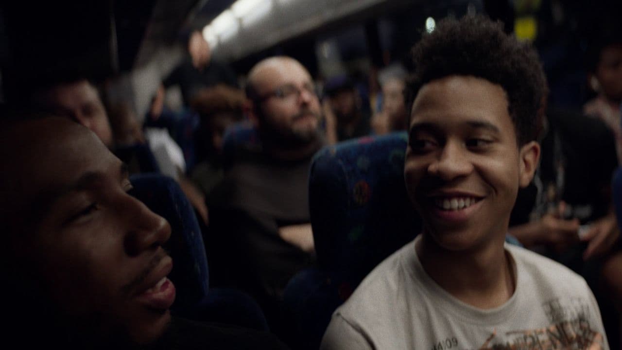 a group of people sitting on a train together