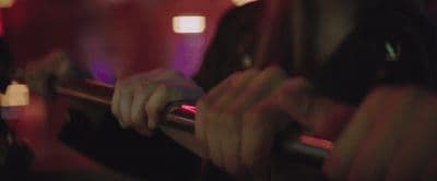 a blurry photo of a person holding a microphone