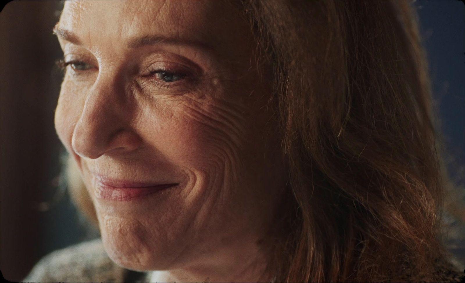 a close up of a person with long hair