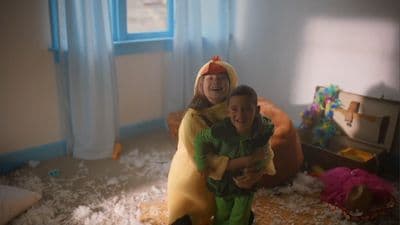 a couple of kids that are standing in a room