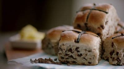 a close up of a bunch of rolls on a table