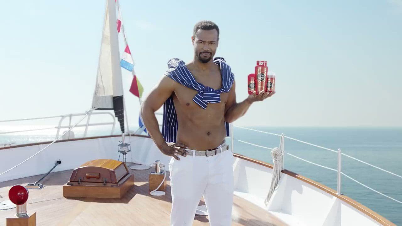 a man standing on the deck of a boat