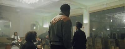 a group of people standing in a room