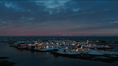 a small village on an island in the middle of the ocean
