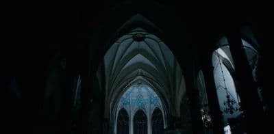 a large cathedral with a clock on the front of it