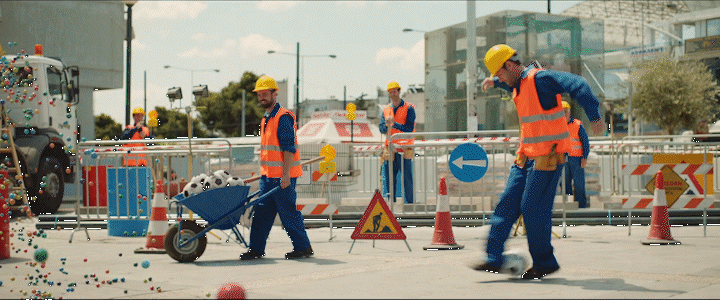 a group of construction workers standing next to each other