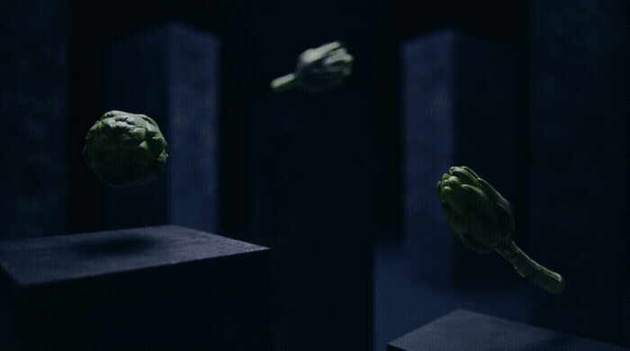 a bunch of broccoli floating in the air
