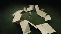 a person standing in front of a pile of paper