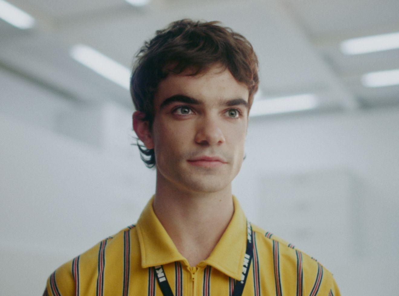 a man with a camera around his neck