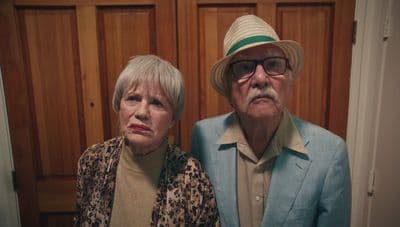 a man and a woman standing next to each other