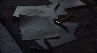 several pieces of paper with a drawing on them