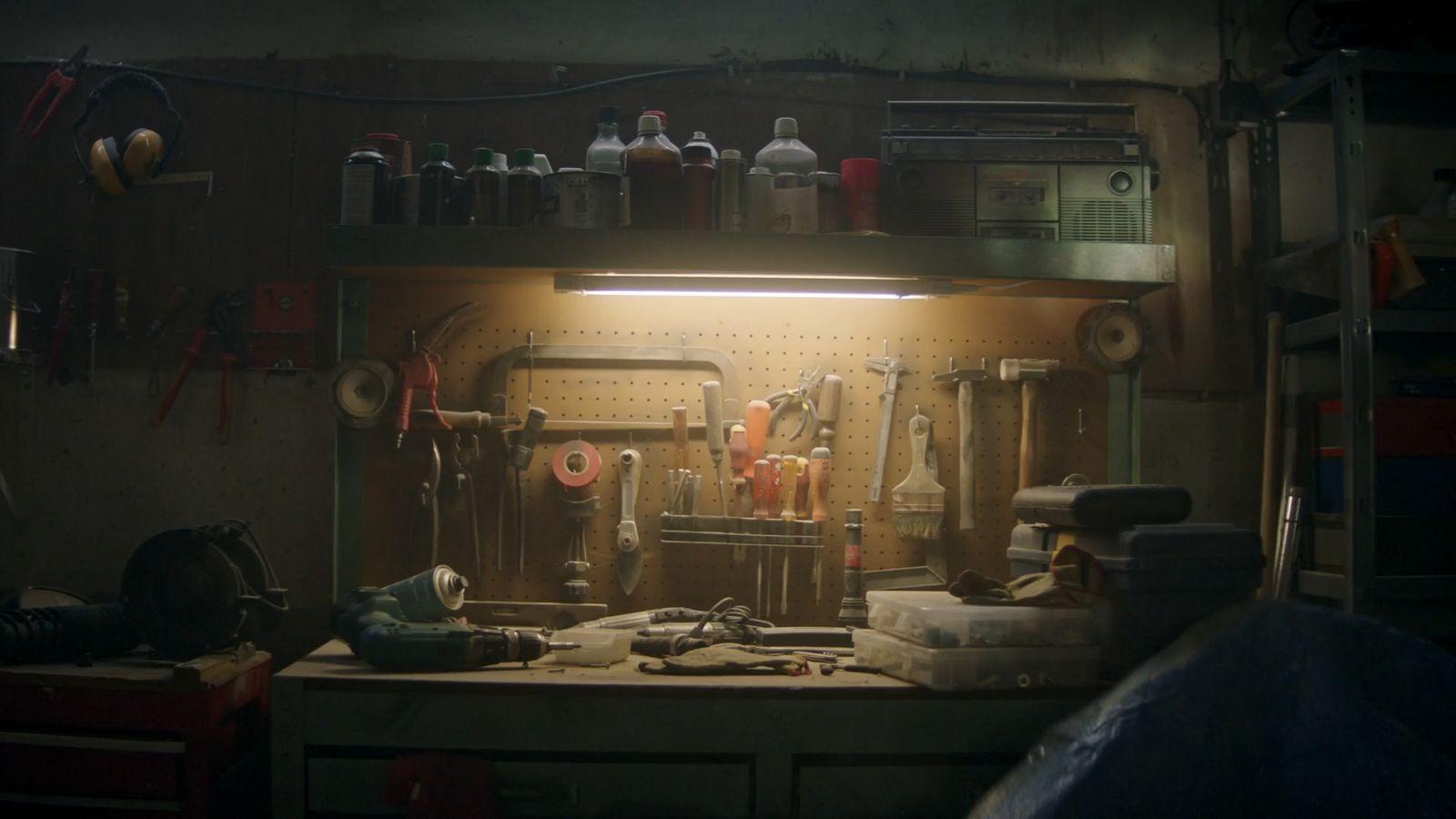 a workbench with a lot of tools on it