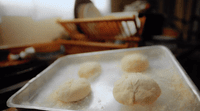 a pan filled with food on top of a stove