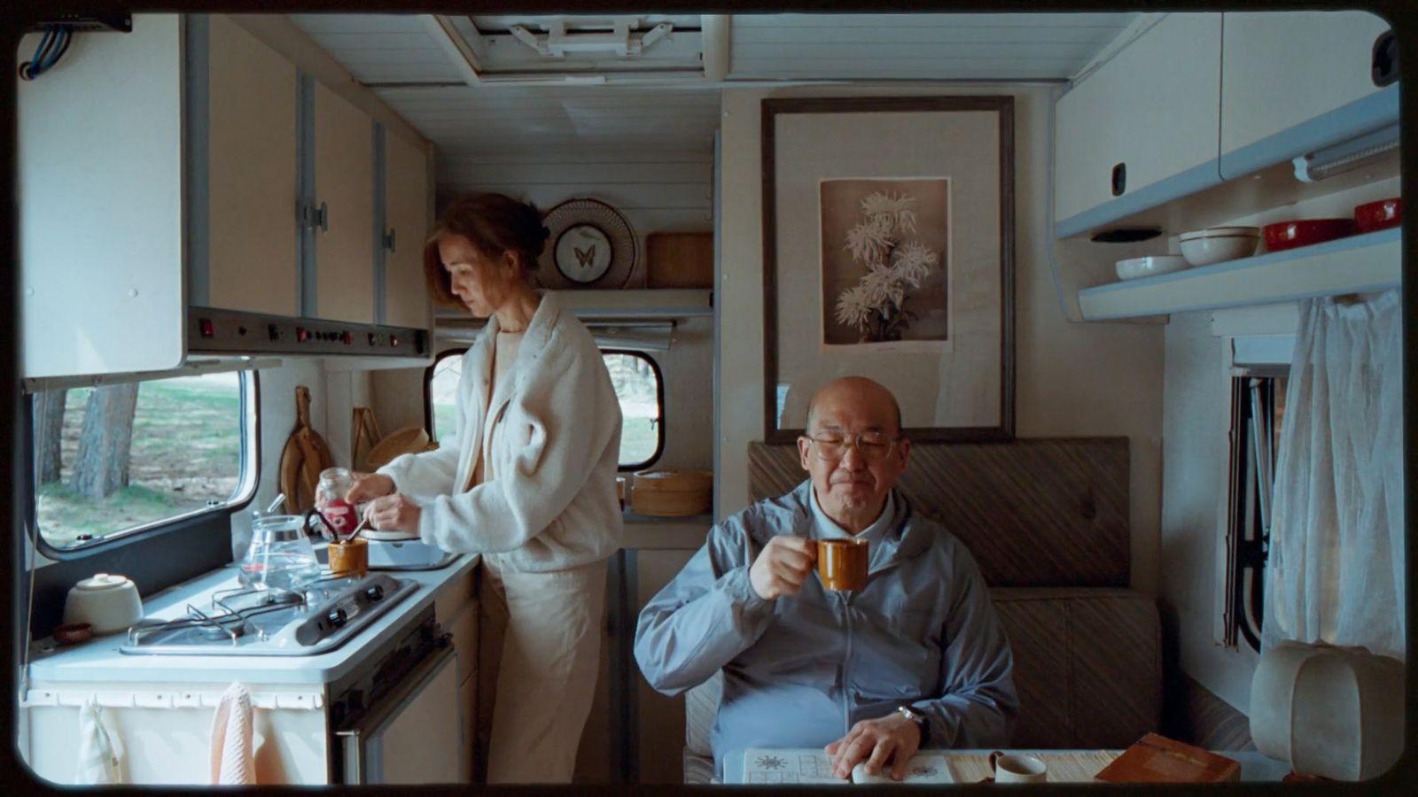 a man and a woman in a kitchen