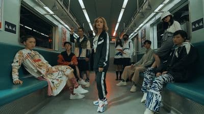 a group of people sitting on a subway train
