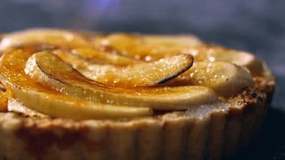 a close up of a pastry with a lot of toppings
