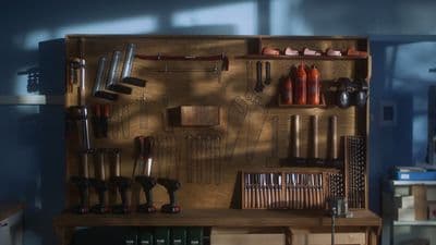 a wooden shelf filled with lots of tools