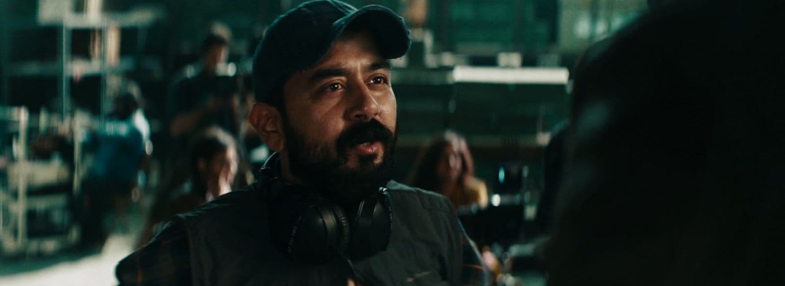 a man with a beard wearing headphones
