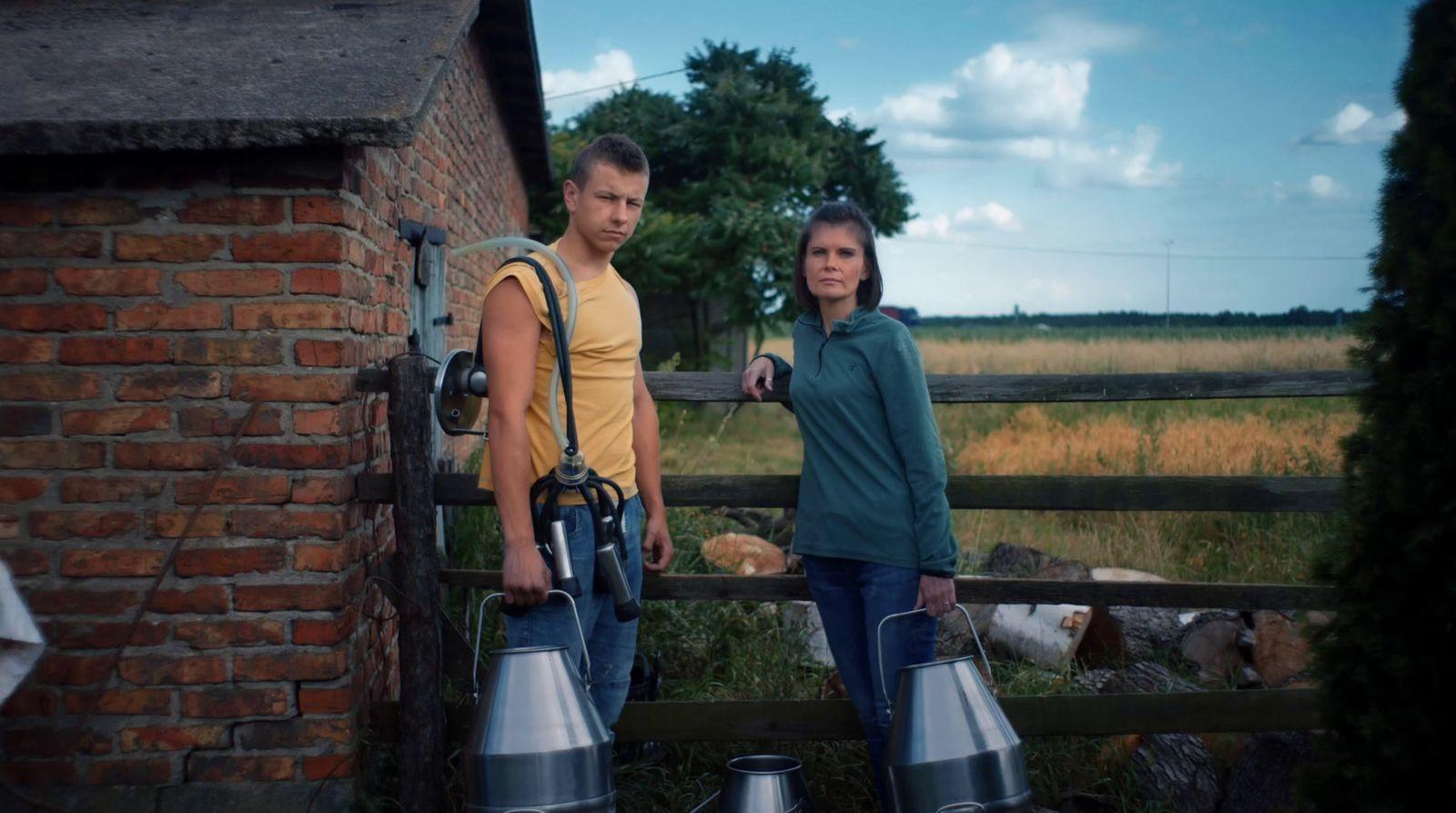 a man and a woman standing next to each other