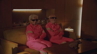 a couple of people that are sitting on a couch