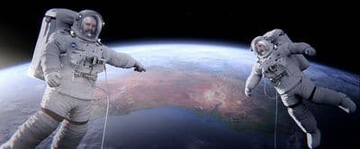 a couple of astronauts floating in space next to each other