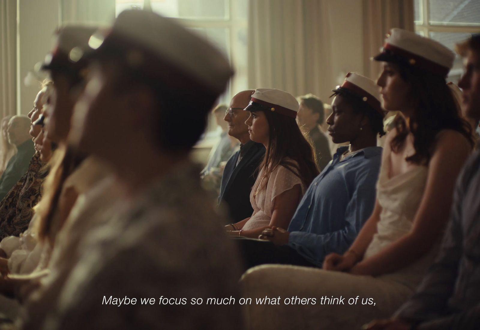 a group of women sitting next to each other