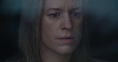 a close up of a person with long hair