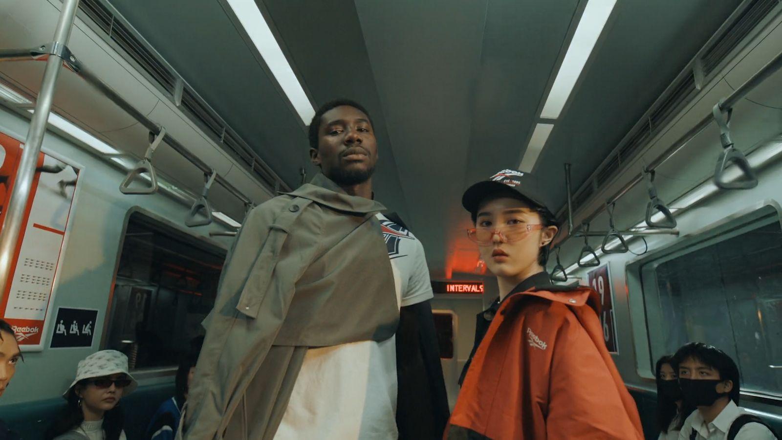 a group of people riding on a subway train