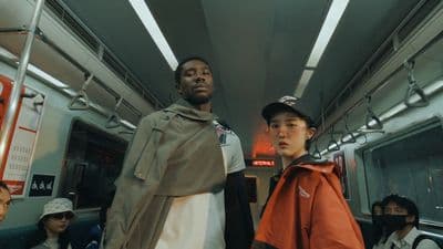 a group of people riding on a subway train