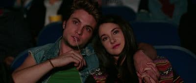 a man and woman sitting next to each other