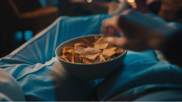 a bowl of food sitting on top of a table