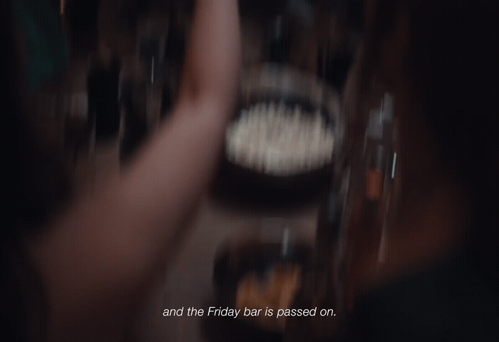 a blurry photo of a person holding a cell phone
