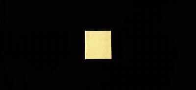 a black square with a yellow rectangle on it