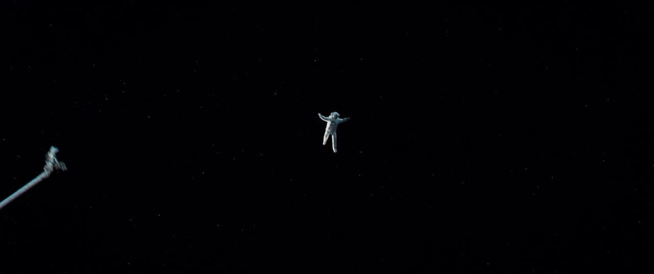 a person flying through the air at night