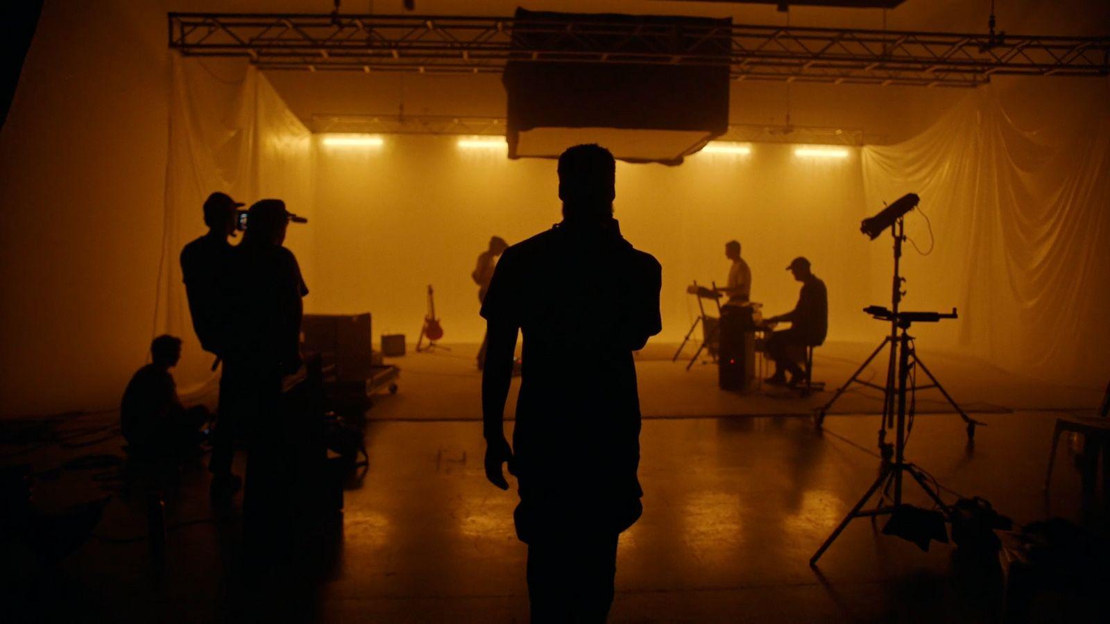 a group of people standing in a room