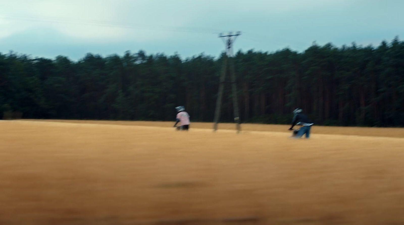 a group of people playing a game of frisbee