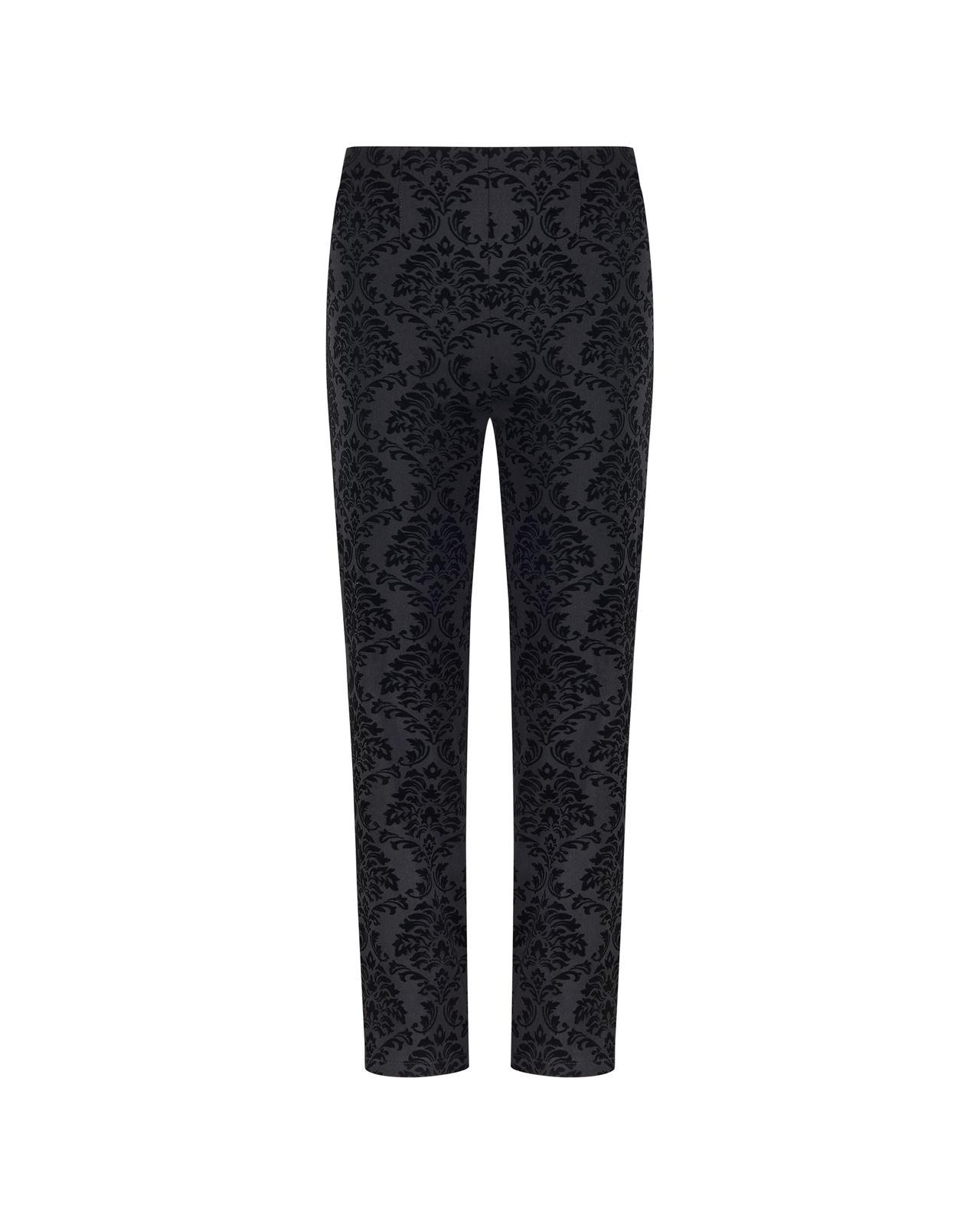 a black and white photo of a woman's pants