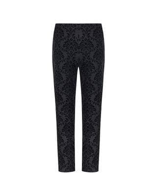 a black and white photo of a woman's pants
