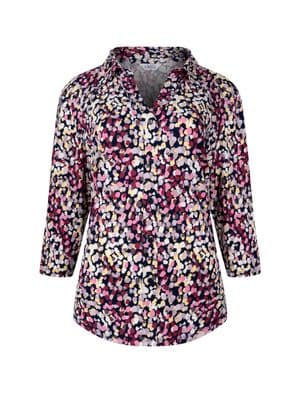 a women's blouse with a multicolored pattern