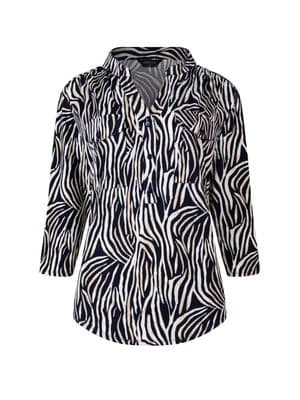 a women's shirt with a zebra print