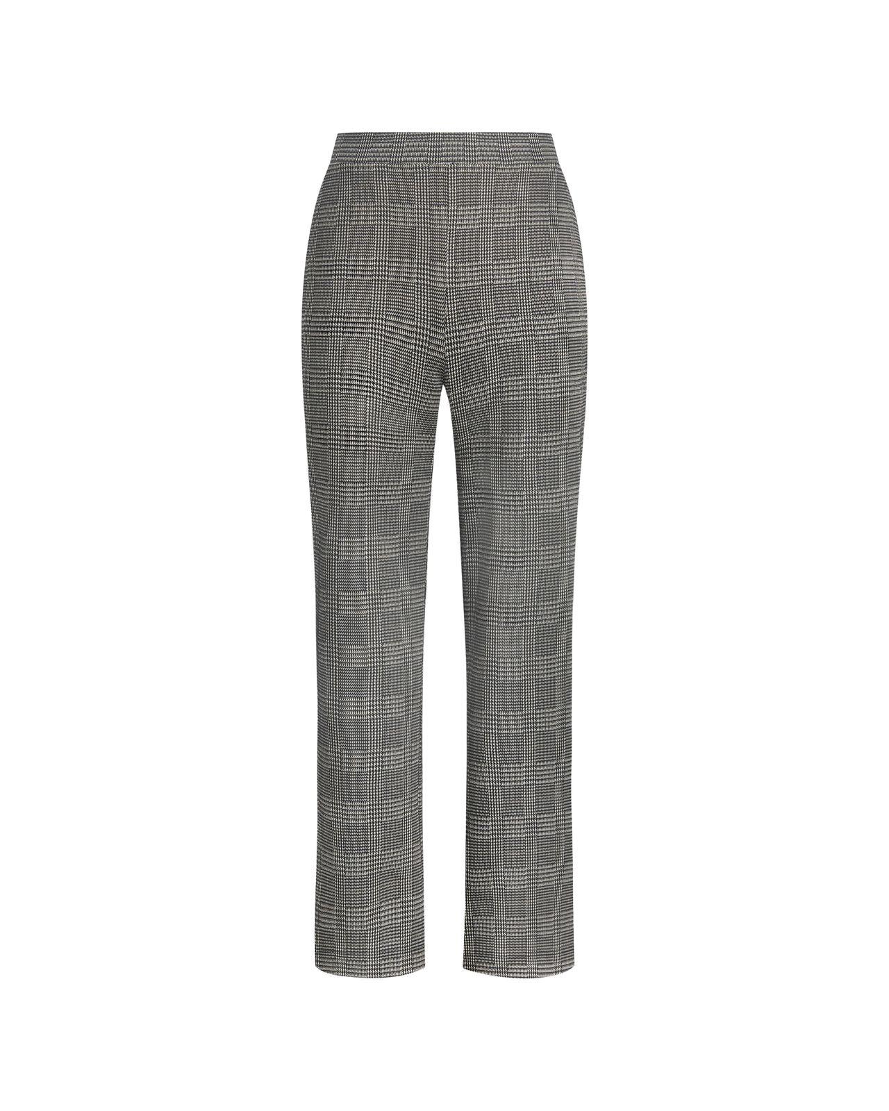 a woman is wearing a gray and black checkered pants