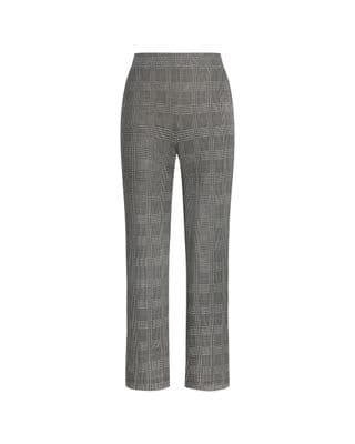a woman is wearing a gray and black checkered pants