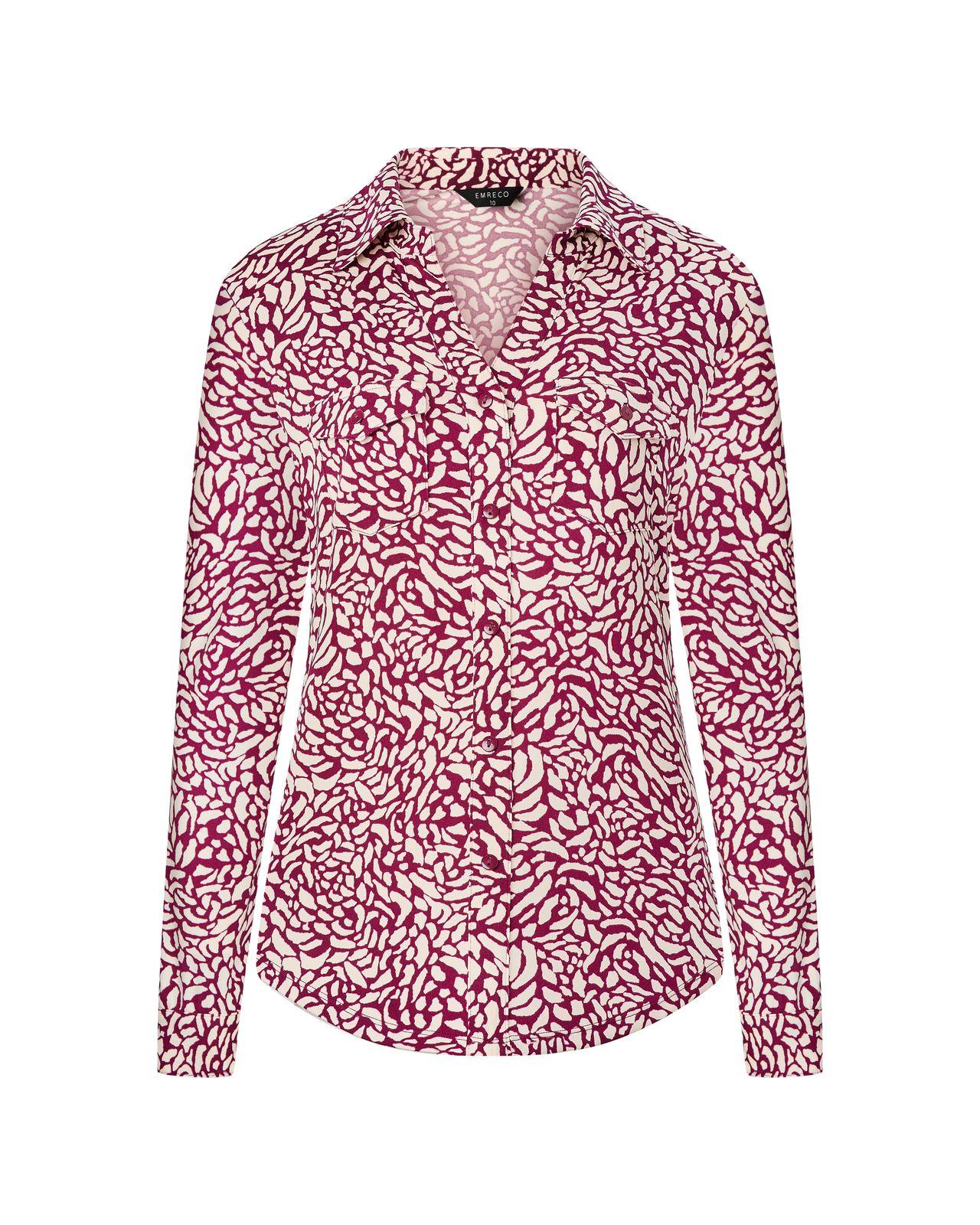 a woman wearing a red and white shirt
