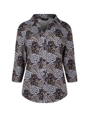a women's jacket with a flower pattern