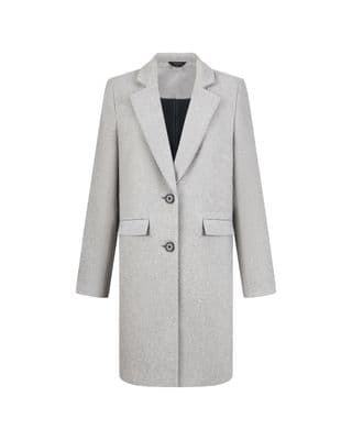 a white coat with a black shirt underneath it