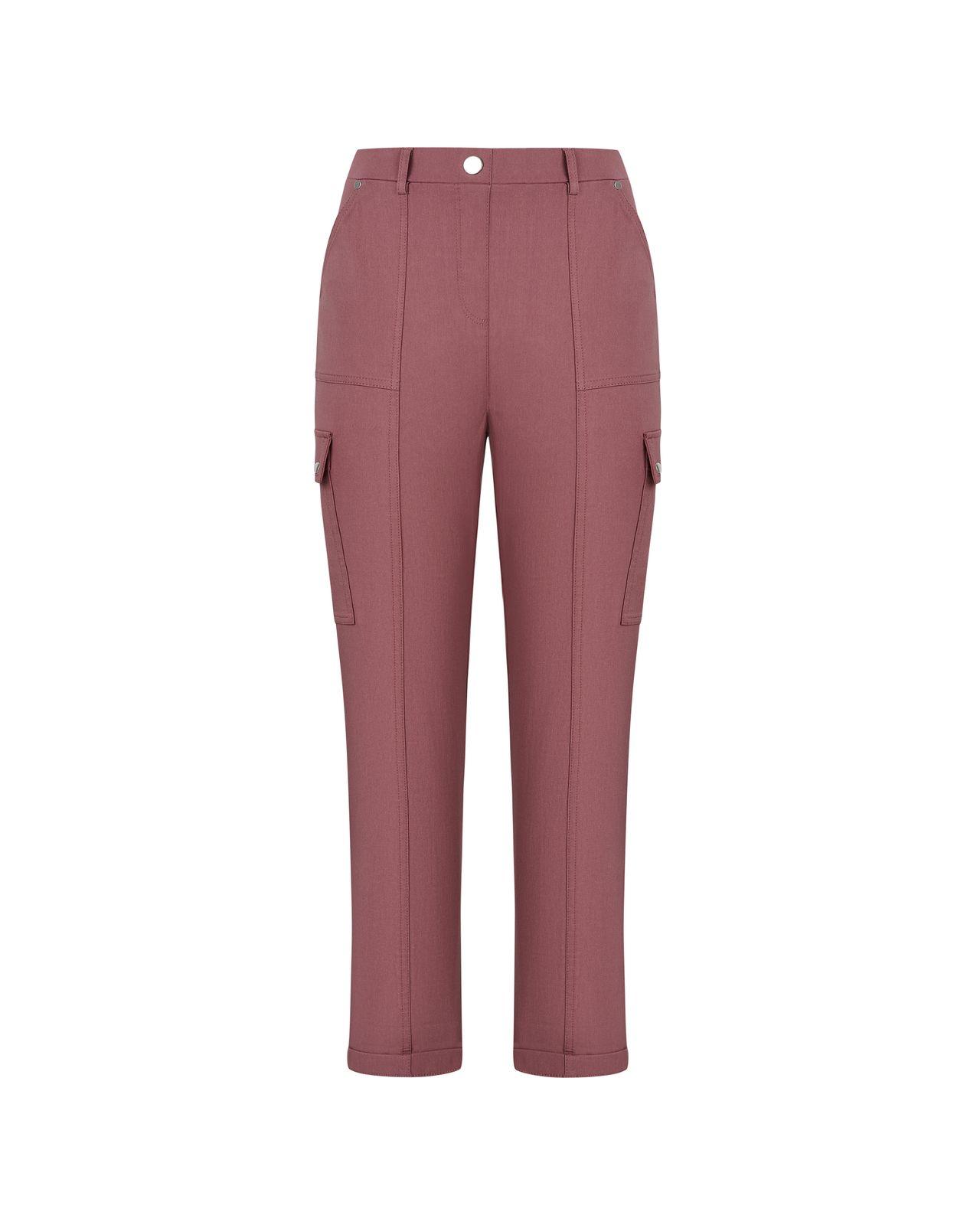 a woman wearing a pink pants with pockets