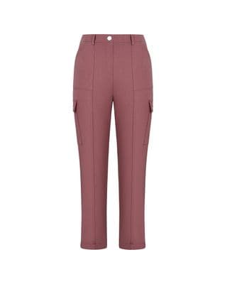a woman wearing a pink pants with pockets