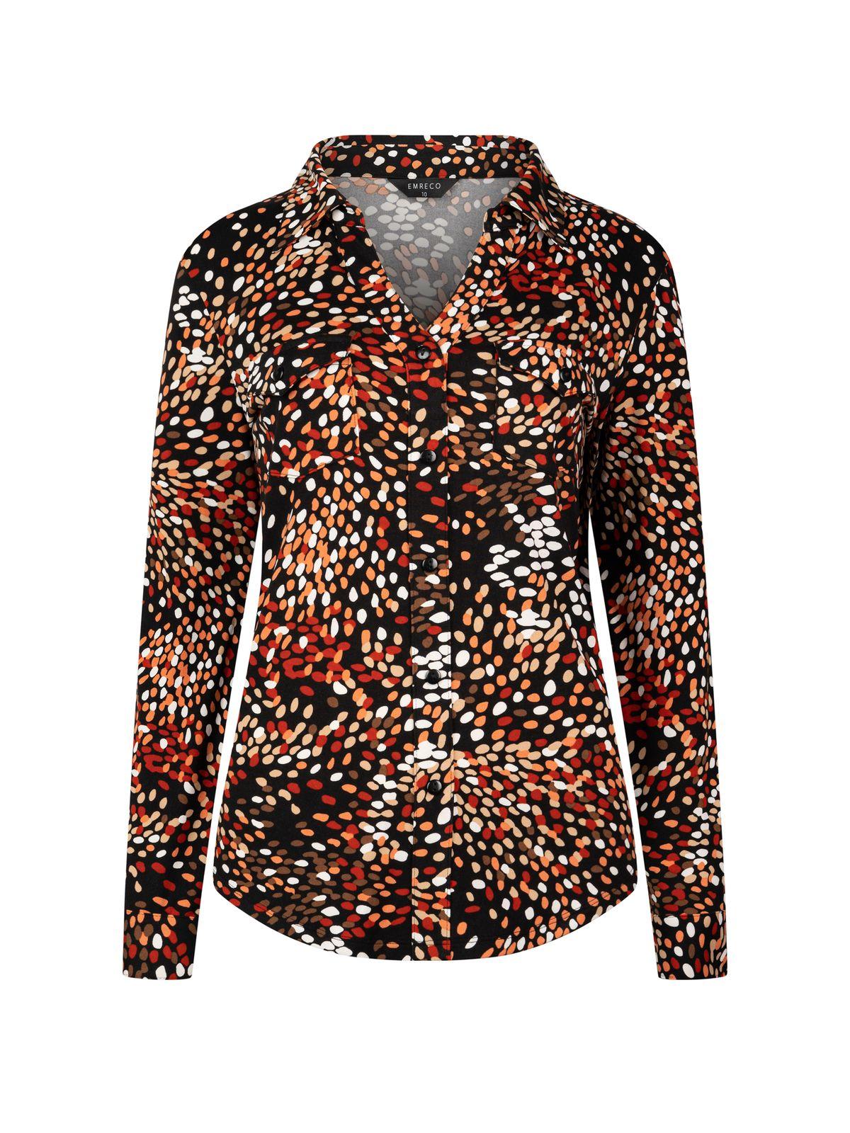 a woman wearing a black and orange shirt