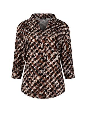 a women's jacket with a pattern on it