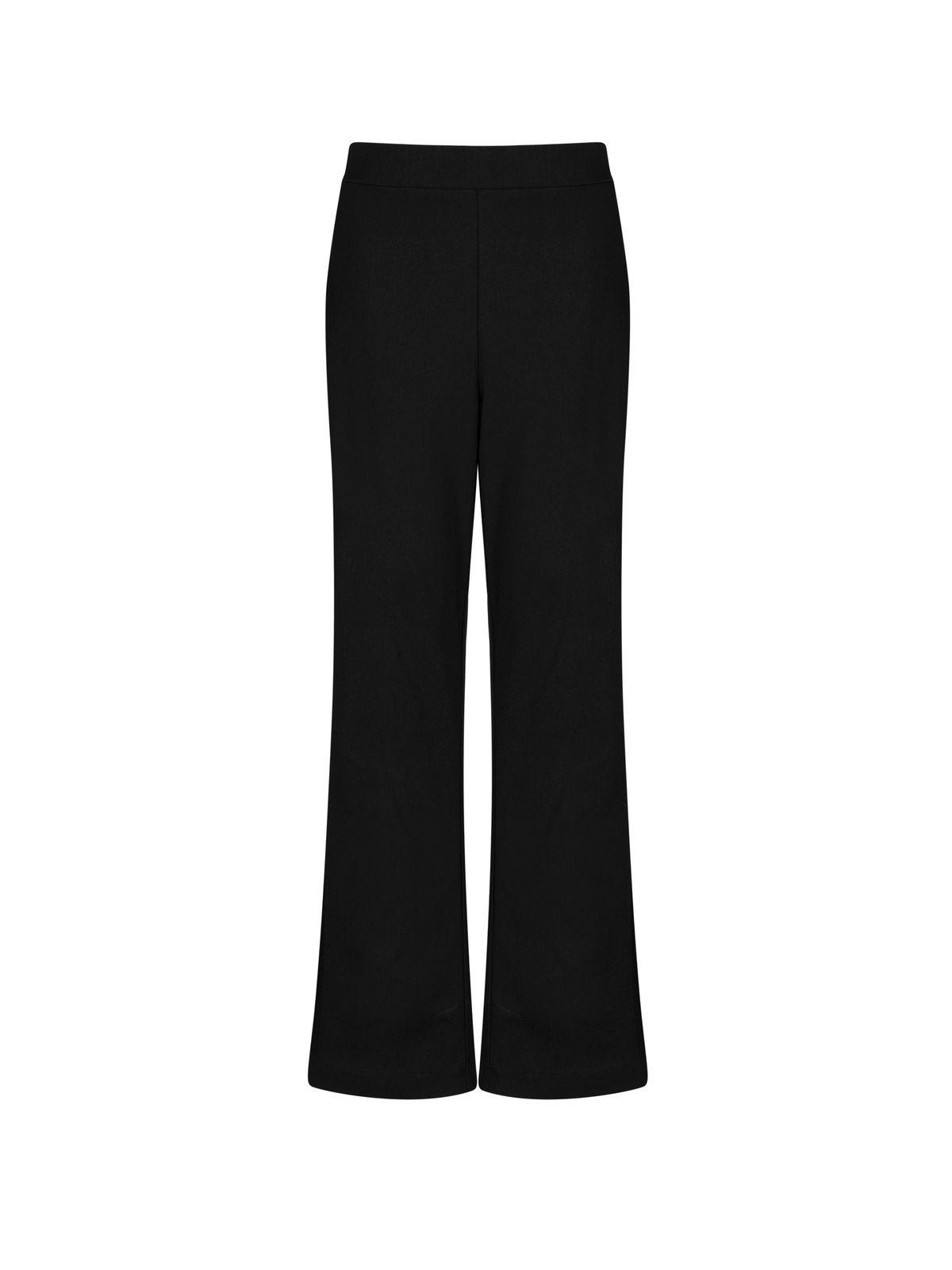 a woman wearing black pants and a white shirt
